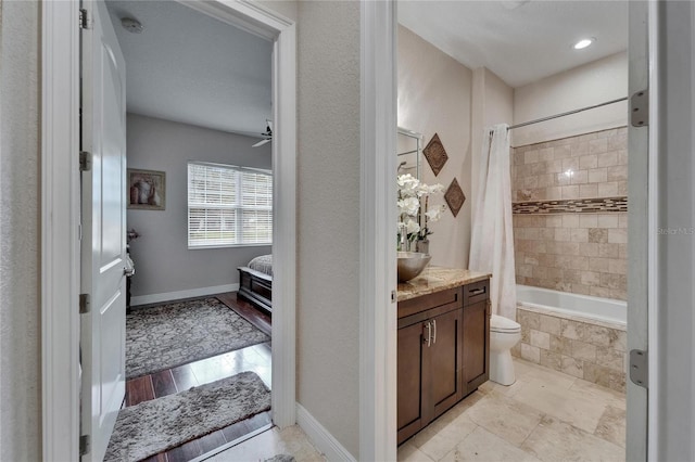 13102 Done Groven Dr, Dover, FL 33527 - ensuite bathroom with vanity and tiled shower / bath combo