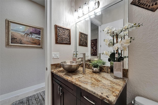 13102 Done Groven Dr, Dover, FL 33527 - bathroom with vanity and a textured wall