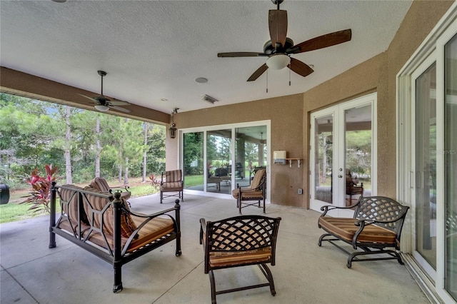 13102 Done Groven Dr, Dover, FL 33527 - sunroom / solarium with ceiling fan and french doors