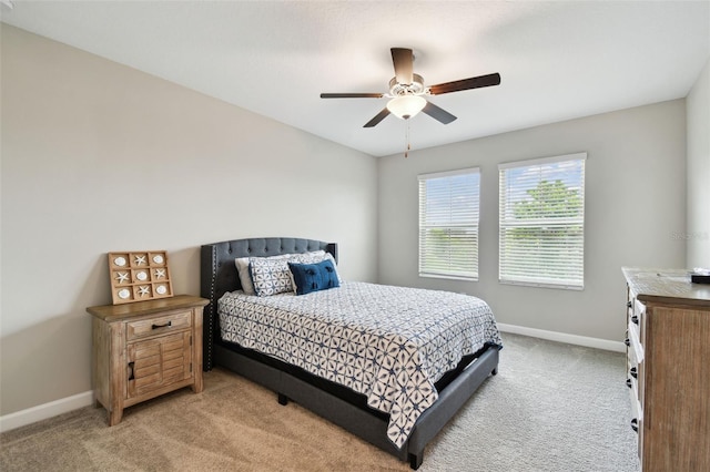 10282 Echo Dock Loop, San Antonio, FL 33576 - bedroom with light carpet and a ceiling fan
