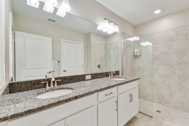 10282 Echo Dock Loop, San Antonio, FL 33576 - full bathroom with double vanity and a walk in shower