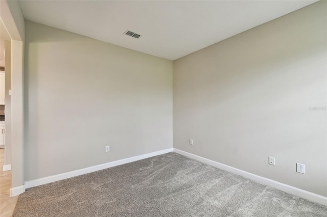 10282 Echo Dock Loop, San Antonio, FL 33576 - carpeted spare room with baseboards