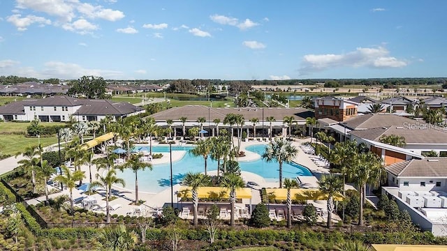 10282 Echo Dock Loop, San Antonio, FL 33576 - aerial perspective of suburban area with a pool area and a large body of water