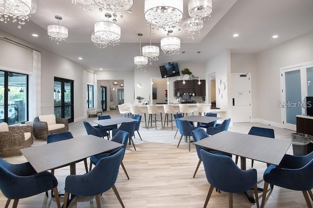 10282 Echo Dock Loop, San Antonio, FL 33576 - dining space with a chandelier, recessed lighting, and light wood-style flooring