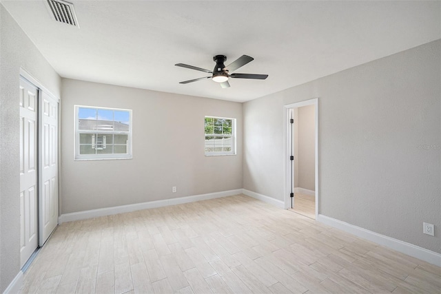 2905 Forest Cir, Seffner, FL 33584 - unfurnished bedroom with light wood finished floors and a ceiling fan
