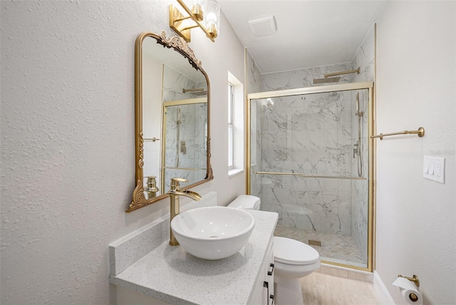 2905 Forest Cir, Seffner, FL 33584 - full bath with vanity, a marble finish shower, and a textured wall