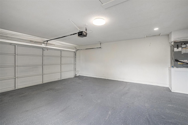 2905 Forest Cir, Seffner, FL 33584 - garage featuring a garage door opener