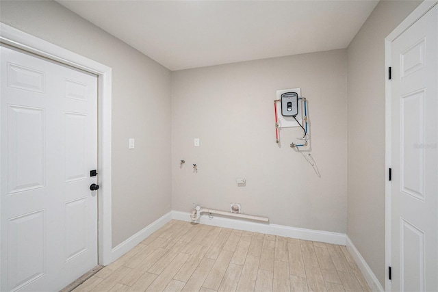 2905 Forest Cir, Seffner, FL 33584 - washroom with light wood finished floors, hookup for an electric dryer, and gas dryer hookup