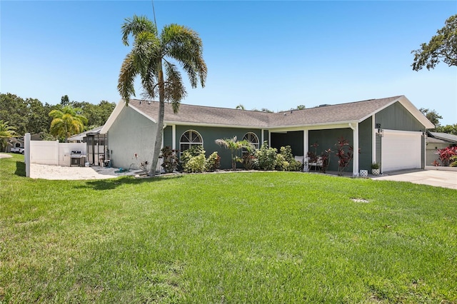 852 Crystal Dr, Palm Harbor, FL 34683 - ranch-style house featuring an attached garage and driveway