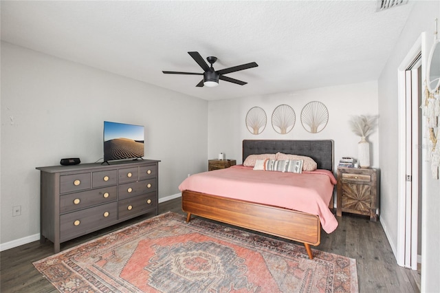 852 Crystal Dr, Palm Harbor, FL 34683 - bedroom with wood finished floors and a ceiling fan