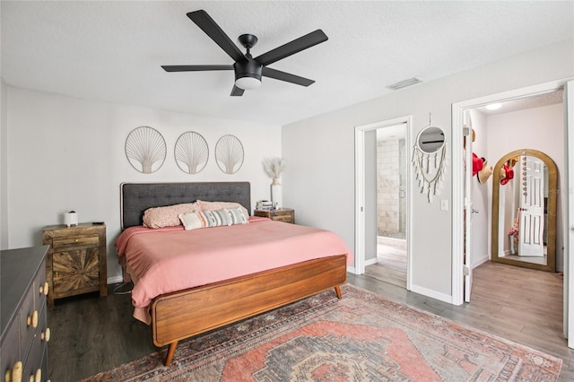 852 Crystal Dr, Palm Harbor, FL 34683 - bedroom featuring wood finished floors and a ceiling fan