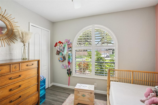 852 Crystal Dr, Palm Harbor, FL 34683 - bedroom featuring wood finished floors and baseboards