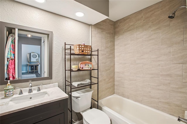 852 Crystal Dr, Palm Harbor, FL 34683 - full bathroom with vanity, a textured wall, and shower / washtub combination