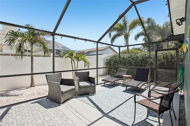 852 Crystal Dr, Palm Harbor, FL 34683 - view of patio / terrace featuring glass enclosure and an outdoor hangout area