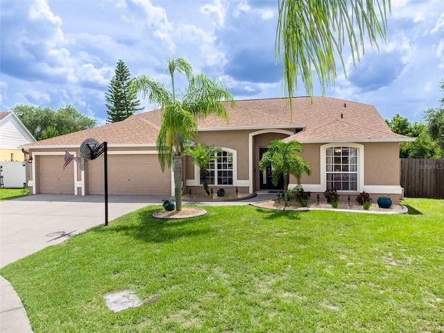 9702 Mary Robin Dr, Riverview, FL 33569 - single story home featuring stucco siding, a garage, driveway, and roof with shingles