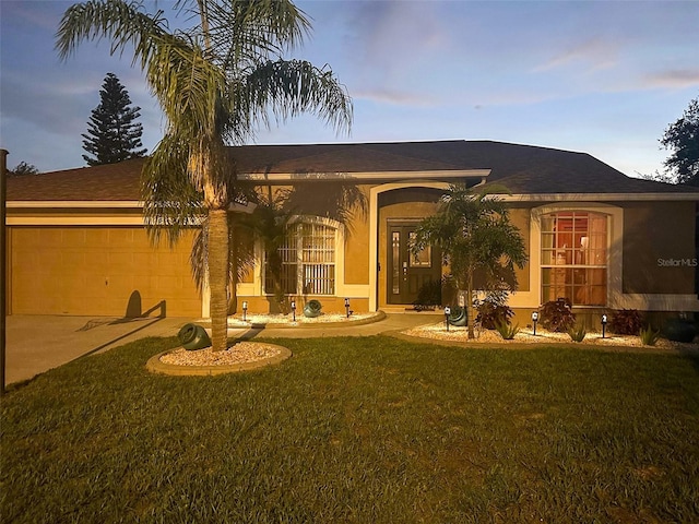 9702 Mary Robin Dr, Riverview, FL 33569 - ranch-style home with an attached garage, a front lawn, concrete driveway, and stucco siding