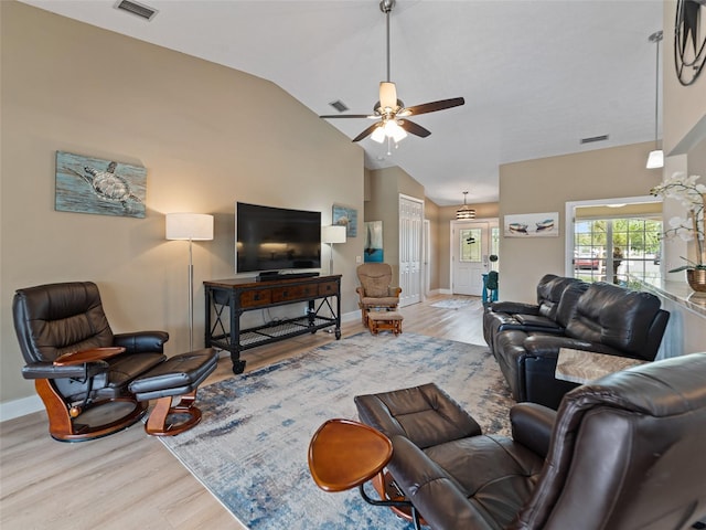 9702 Mary Robin Dr, Riverview, FL 33569 - living room featuring wood finished floors, lofted ceiling, and a ceiling fan