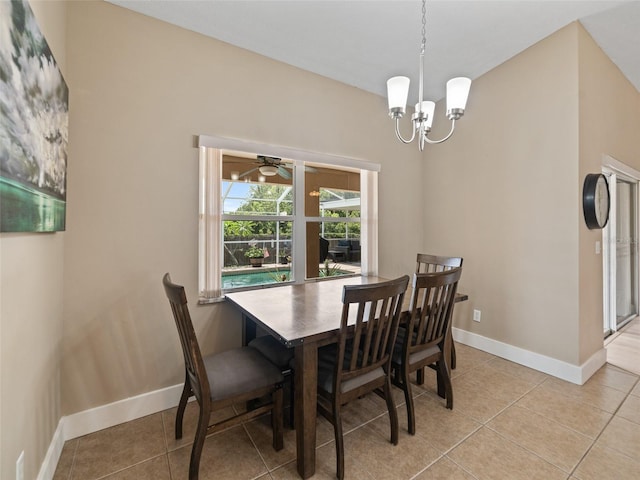9702 Mary Robin Dr, Riverview, FL 33569 - dining space featuring light tile patterned flooring, a chandelier, and a ceiling fan