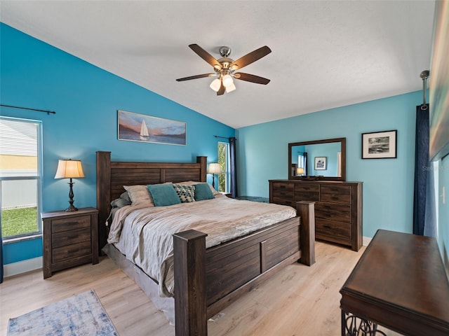 9702 Mary Robin Dr, Riverview, FL 33569 - bedroom with vaulted ceiling, multiple windows, light wood-type flooring, and ceiling fan