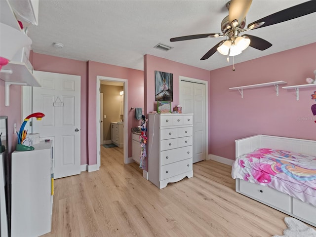 9702 Mary Robin Dr, Riverview, FL 33569 - bedroom with light wood-style floors, a closet, and a ceiling fan
