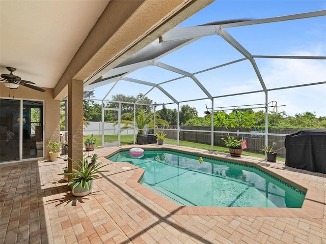 9702 Mary Robin Dr, Riverview, FL 33569 - view of pool featuring ceiling fan, a fenced backyard, a patio area, area for grilling, and glass enclosure