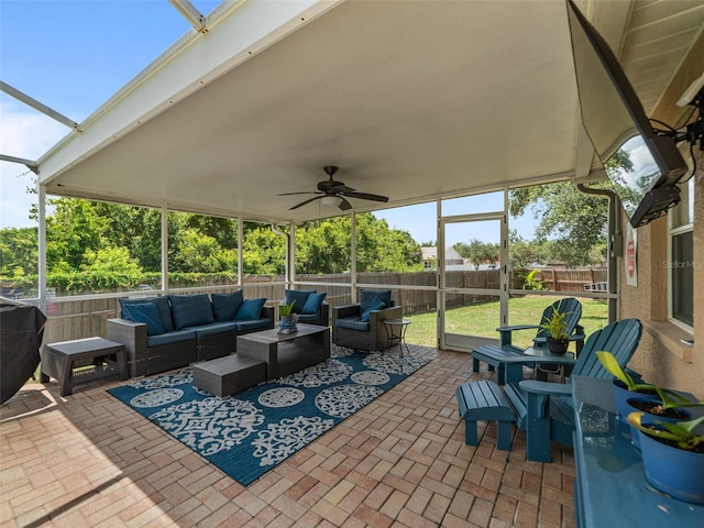 9702 Mary Robin Dr, Riverview, FL 33569 - fenced backyard featuring outdoor lounge area, a patio, a ceiling fan, and grilling area