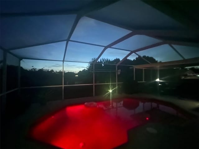 9702 Mary Robin Dr, Riverview, FL 33569 - outdoor pool with glass enclosure and a patio