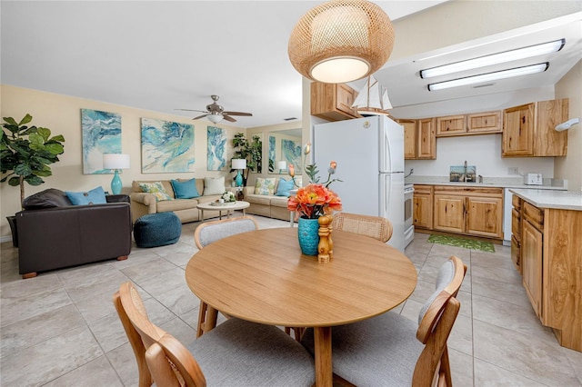 8584 111th St Unit 308, Seminole, FL 33772 - dining area featuring light tile patterned floors and a ceiling fan