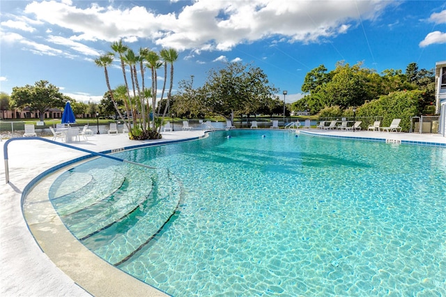 8584 111th St Unit 308, Seminole, FL 33772 - community pool featuring a patio area