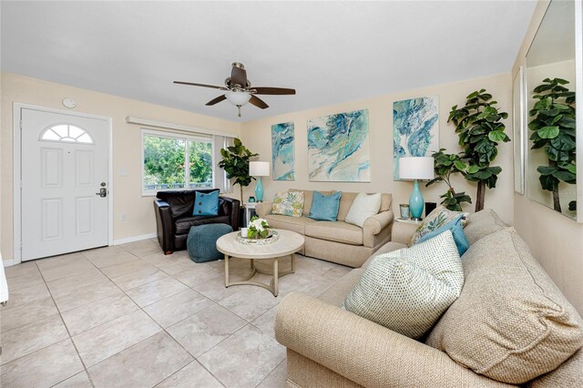 8584 111th St Unit 308, Seminole, FL 33772 - living area with a ceiling fan and light tile patterned flooring