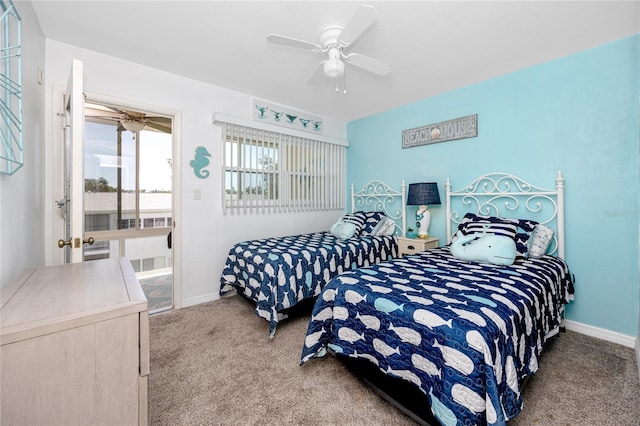 8584 111th St Unit 308, Seminole, FL 33772 - carpeted bedroom featuring baseboards and a ceiling fan