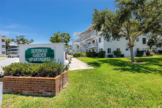 8584 111th St Unit 308, Seminole, FL 33772 - community / neighborhood sign with a yard