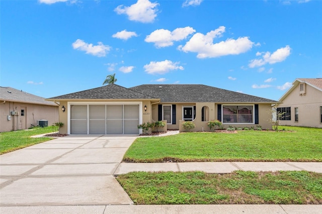 4530 Zack Dr, New Port Richey, FL 34653 - ranch-style house with stucco siding, an attached garage, concrete driveway, and a front lawn
