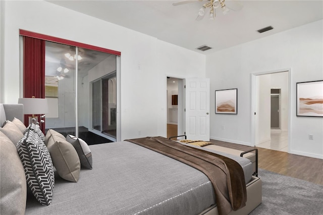 211 Arlington Ave E, Oldsmar, FL 34677 - bedroom with wood finished floors and a ceiling fan