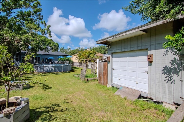 211 Arlington Ave E, Oldsmar, FL 34677 - view of yard with a garage