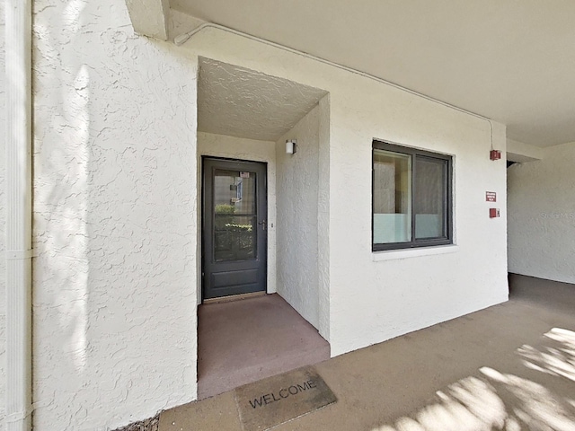 700 Starkey Rd Unit 311, Largo, FL 33771 - property entrance with stucco siding