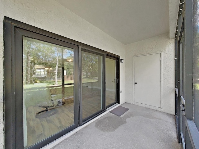 700 Starkey Rd Unit 311, Largo, FL 33771 - doorway to property featuring stucco siding