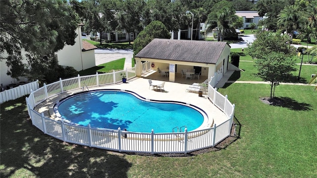 700 Starkey Rd Unit 311, Largo, FL 33771 - view of pool featuring a fenced backyard, a patio, and view of wooded area