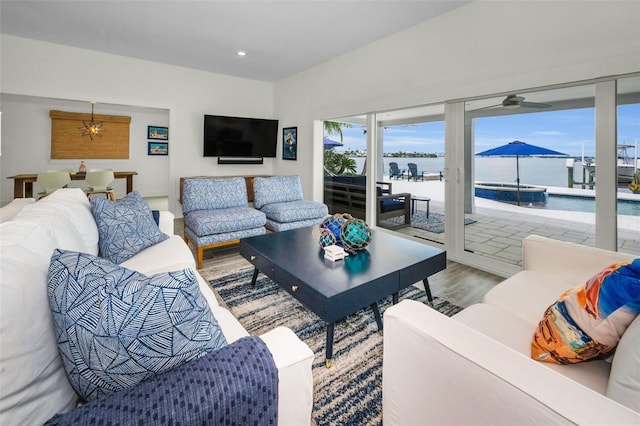 4381 Poinsettia Dr, St Pete Beach, FL 33706 - living room with wood finished floors, recessed lighting, and a ceiling fan