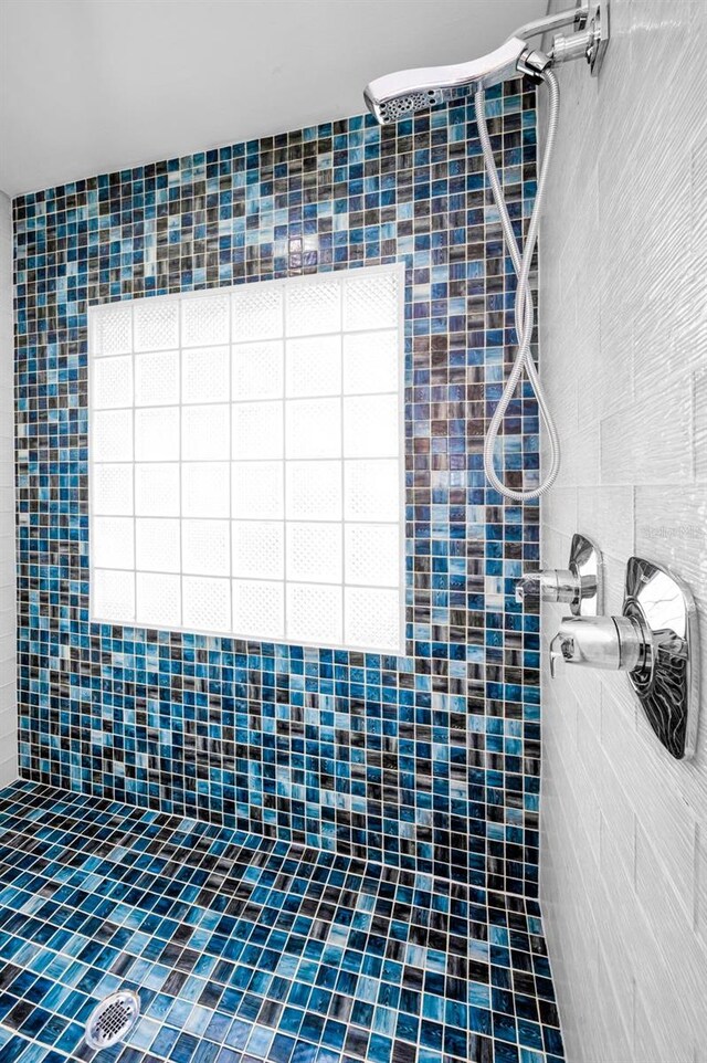4381 Poinsettia Dr, St Pete Beach, FL 33706 - full bathroom featuring tiled shower