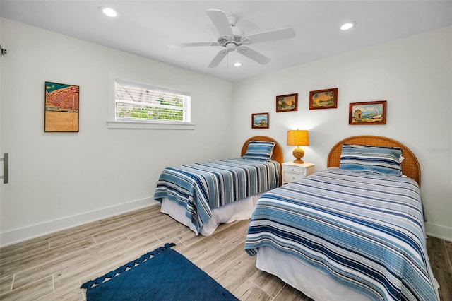 4381 Poinsettia Dr, St Pete Beach, FL 33706 - bedroom featuring wood finished floors, recessed lighting, and a ceiling fan