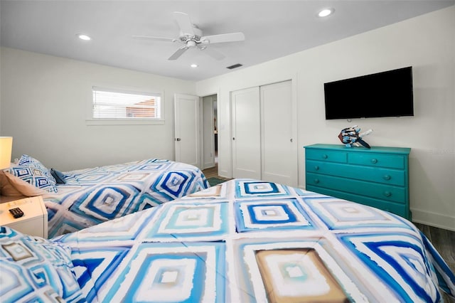 4381 Poinsettia Dr, St Pete Beach, FL 33706 - bedroom featuring a closet, recessed lighting, wood finished floors, and ceiling fan