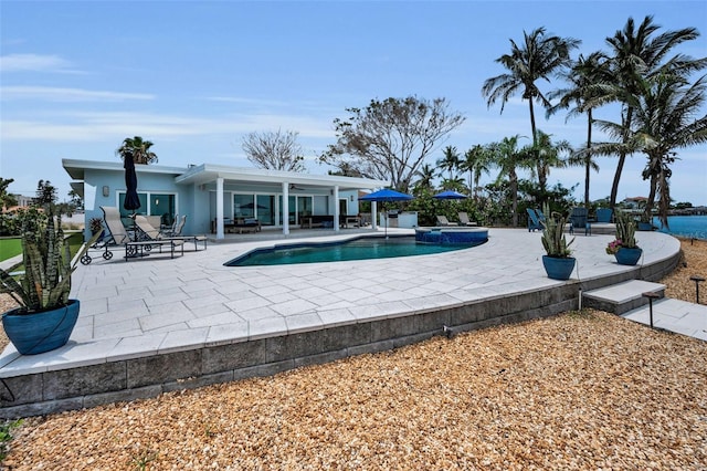 4381 Poinsettia Dr, St Pete Beach, FL 33706 - view of pool with a patio and a pool with connected hot tub