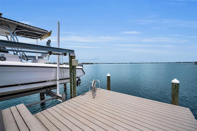 4381 Poinsettia Dr, St Pete Beach, FL 33706 - dock with boat lift and a water view
