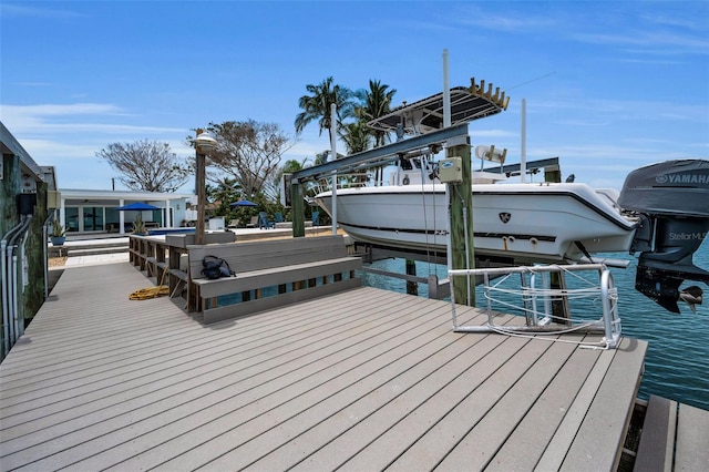 4381 Poinsettia Dr, St Pete Beach, FL 33706 - dock featuring boat lift