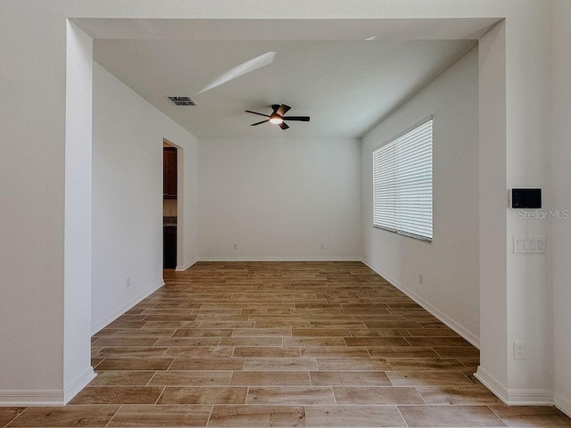 38120 Shale Stone Ct, Zephyrhills, FL 33540 - empty room featuring a ceiling fan and light wood-type flooring