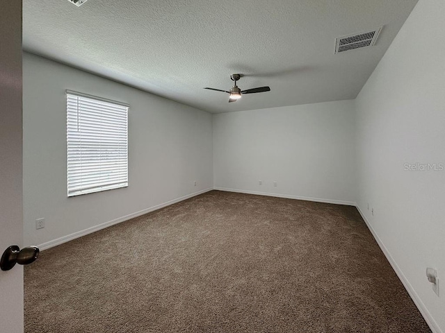38120 Shale Stone Ct, Zephyrhills, FL 33540 - spare room featuring carpet flooring, a ceiling fan, and a textured ceiling