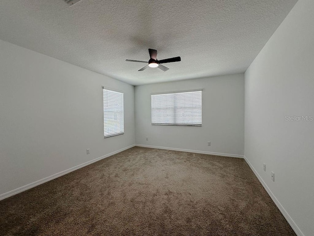 38120 Shale Stone Ct, Zephyrhills, FL 33540 - spare room with carpet, ceiling fan, and a textured ceiling