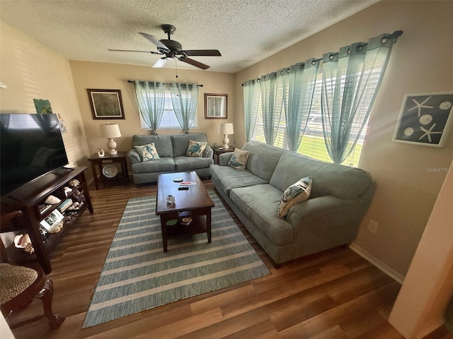 1814 Driftwood Cir S, Oldsmar, FL 34677 - living area with wood finished floors, a ceiling fan, and a textured ceiling