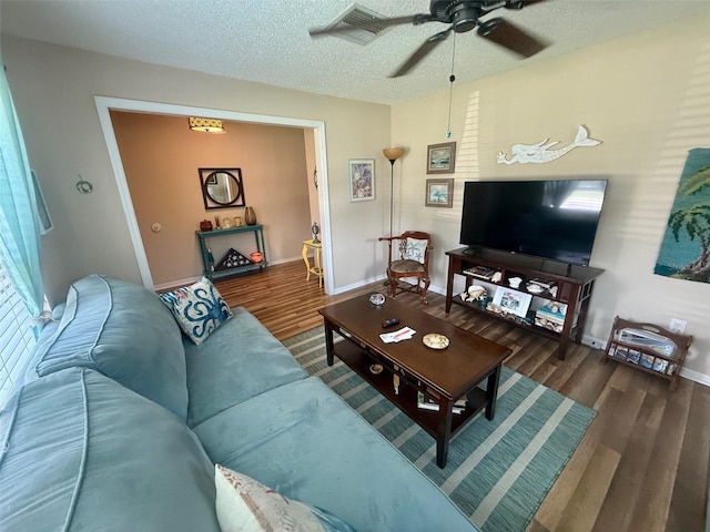 1814 Driftwood Cir S, Oldsmar, FL 34677 - living room with wood finished floors, ceiling fan, and a textured ceiling